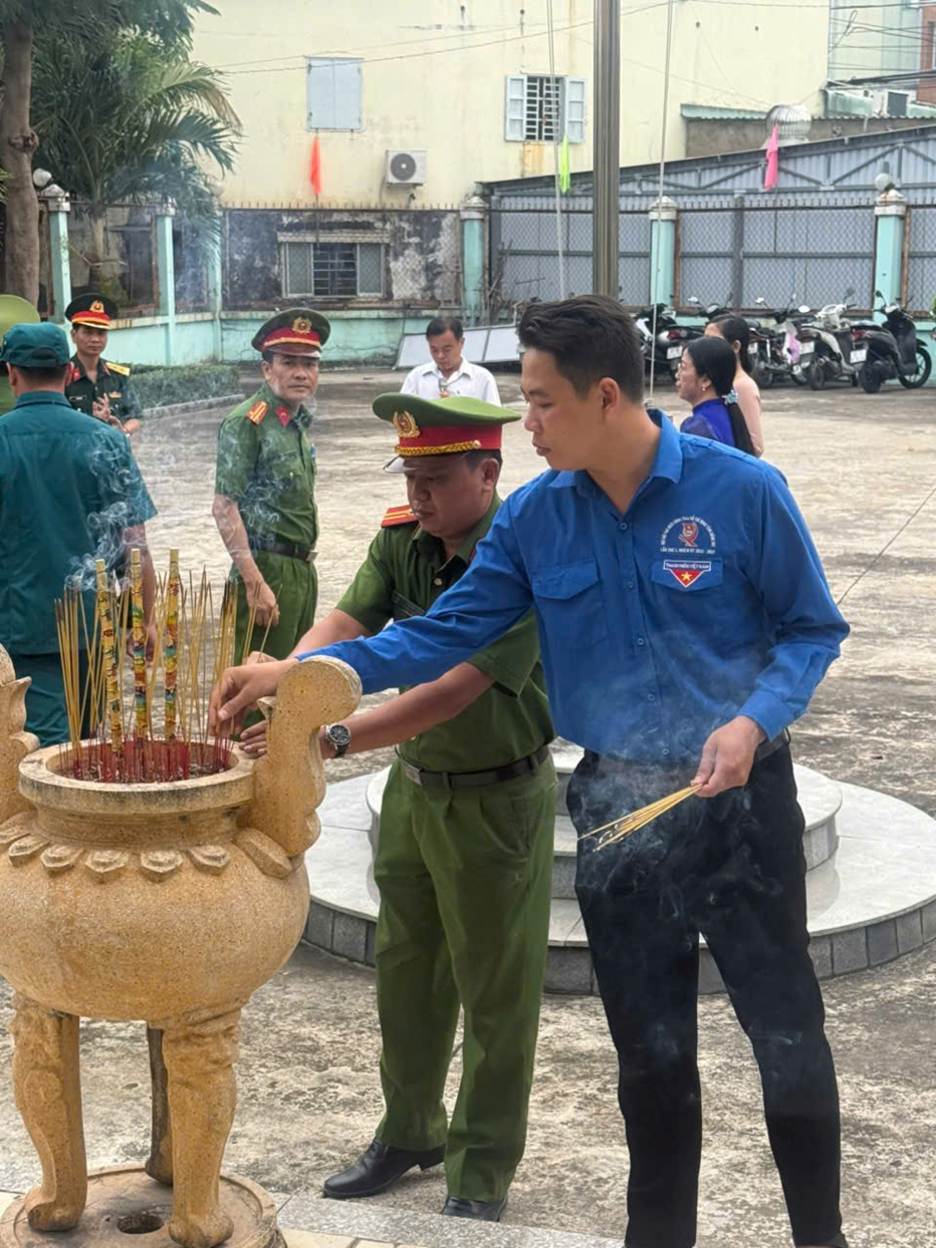 ''A person lighting incense in a pot

AI-generated content may be incorrect.''